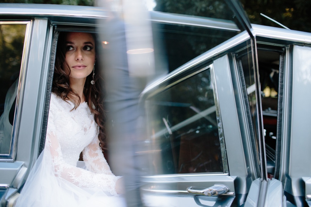 Bride in Daimler DS420 Classic wedding car